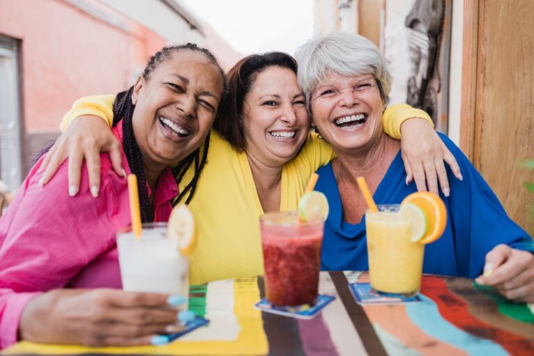 Multiracial,Senior,Woman,Having,Fun,Drinking,Healthy,Smoothies,At,Brunch